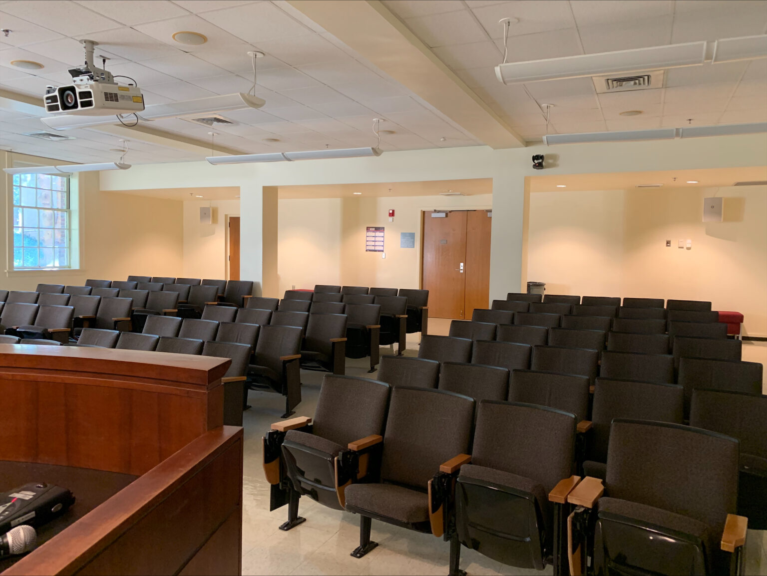 Interior of a seminar room, from the perspective of a lectern.