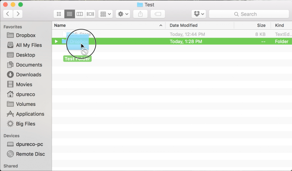 Screenshot of selecting and dragging an example file into the Dropbox folder.