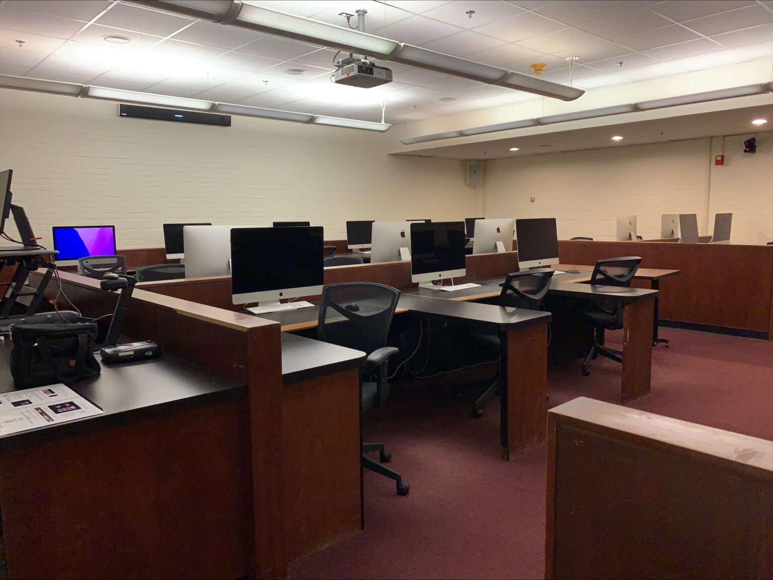 Alternate view of Carroll 059, with wooden desks and Mac monitors